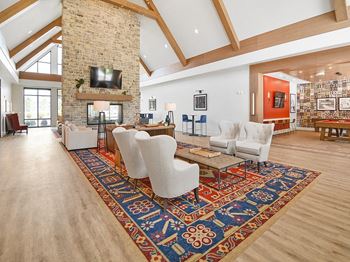 Interior lounge with fireplace and tv